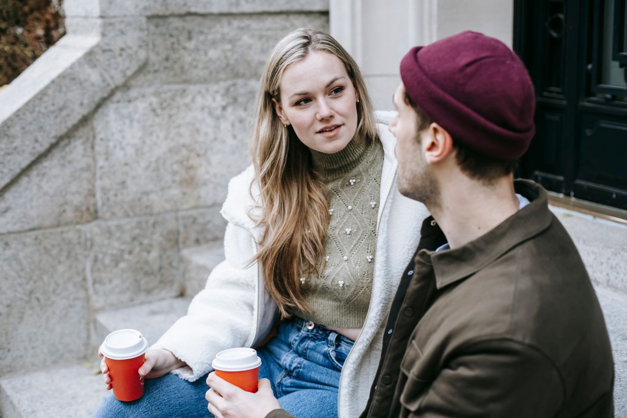 couple talking porch coffee cozy