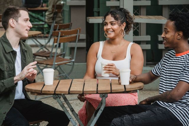 friends deep conversation cafe