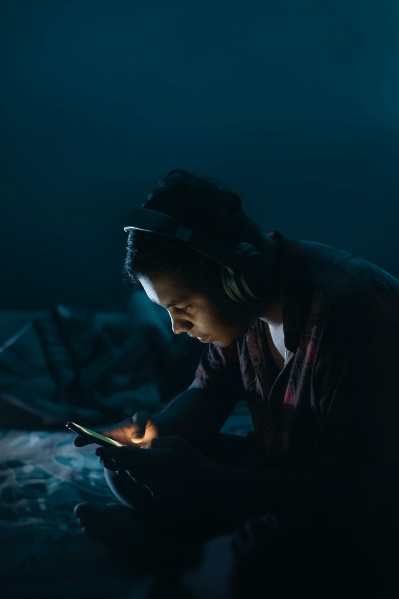 soft lighting indoor headphones closed eyes