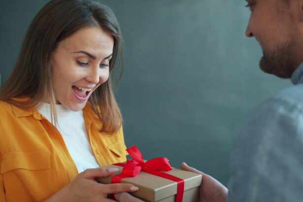 person receiving thoughtful wrapped gift smile