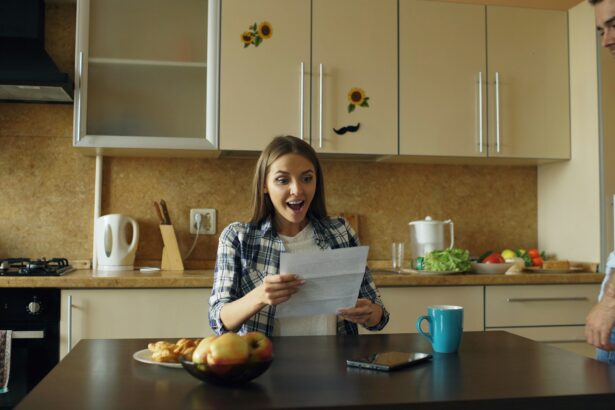 couple sitting at kitchen table talking calmly notebook